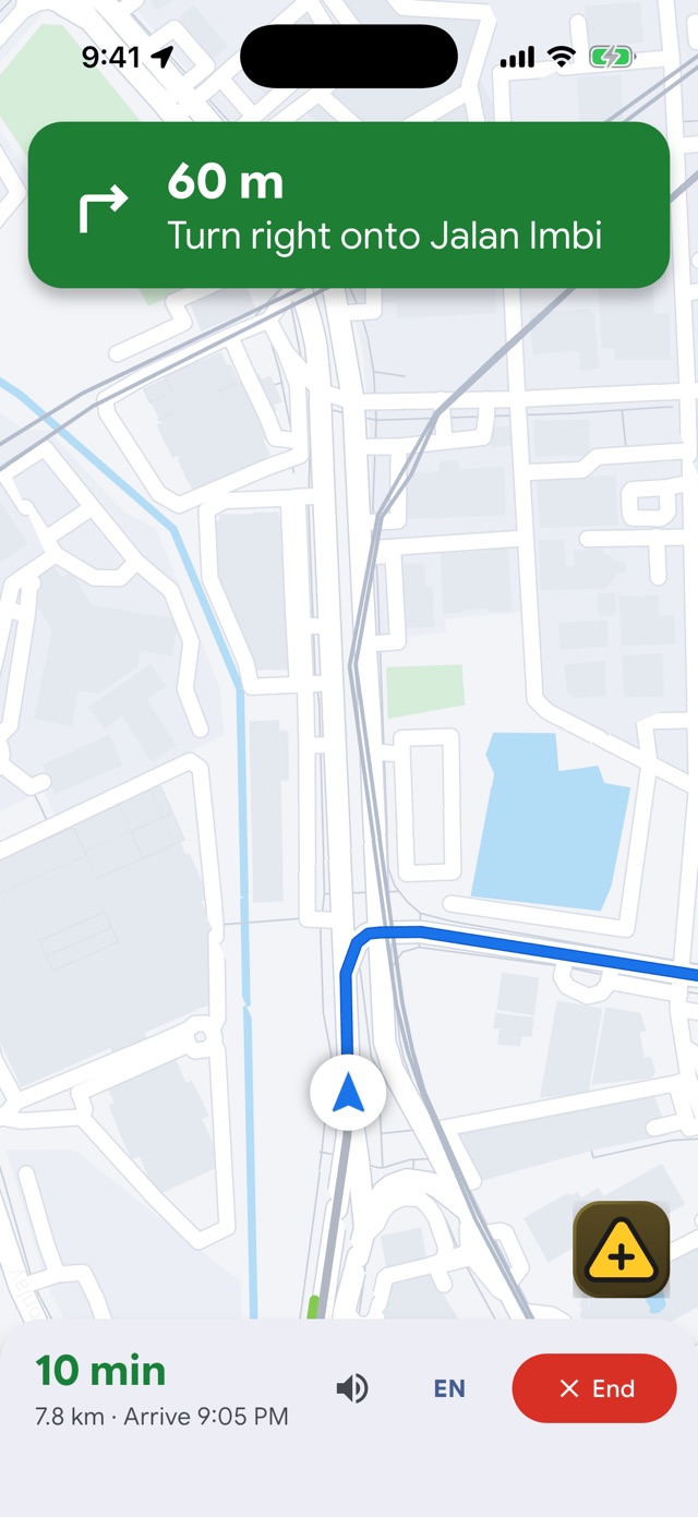 Navigation screen: in 150 m turn right onto Jalan Imbi, 11 minutes remaining, with the report button